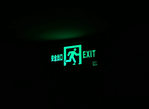 Exit sign with description in English and Chinese